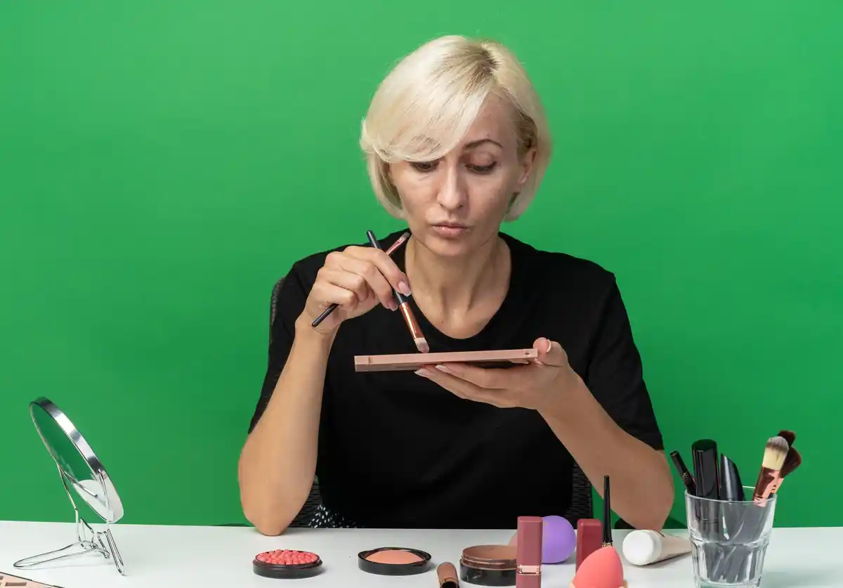 old lipstick being used as highlighter on cheek