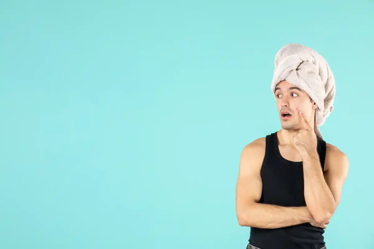 shocked person washing hair with cold water