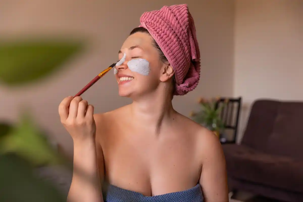 woman applying potato based natural face mask home czech