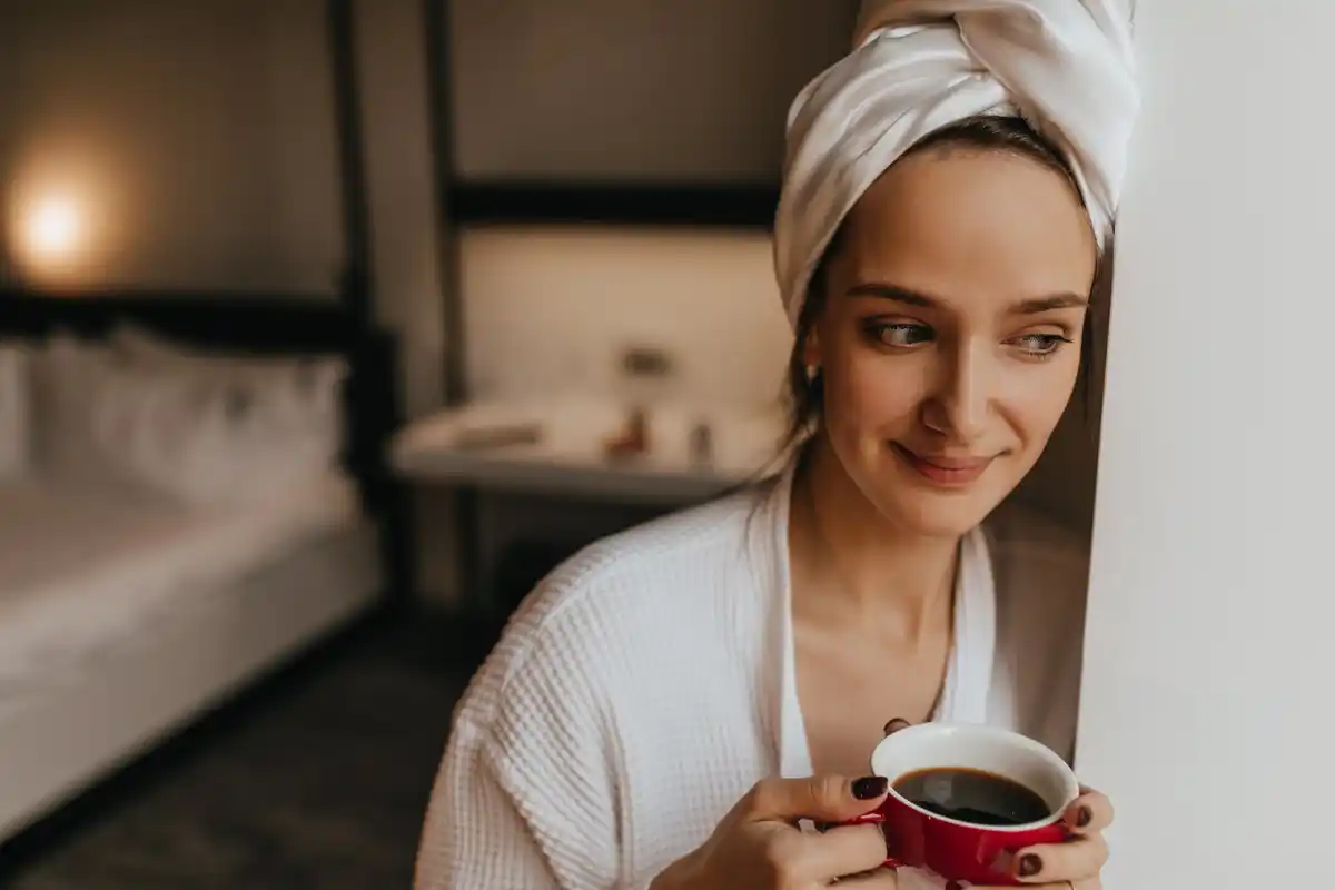 natural aging prevention skincare mature woman Czech bathroom morning