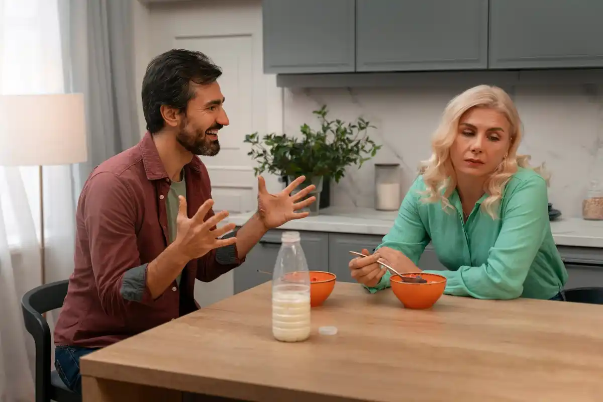 calm pause during couple argument czech kitchen