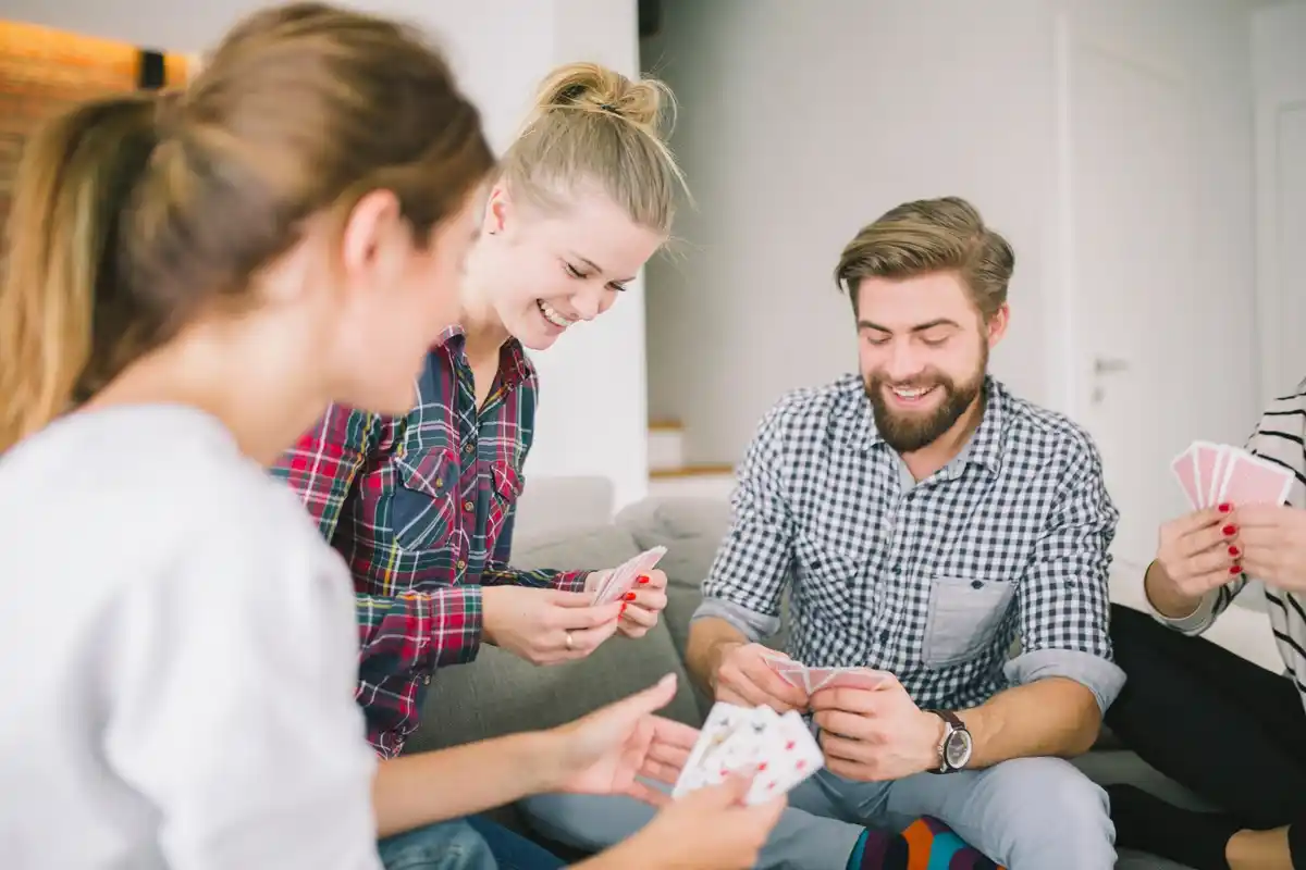 Czech family looking at smartphone with shopping savings icons