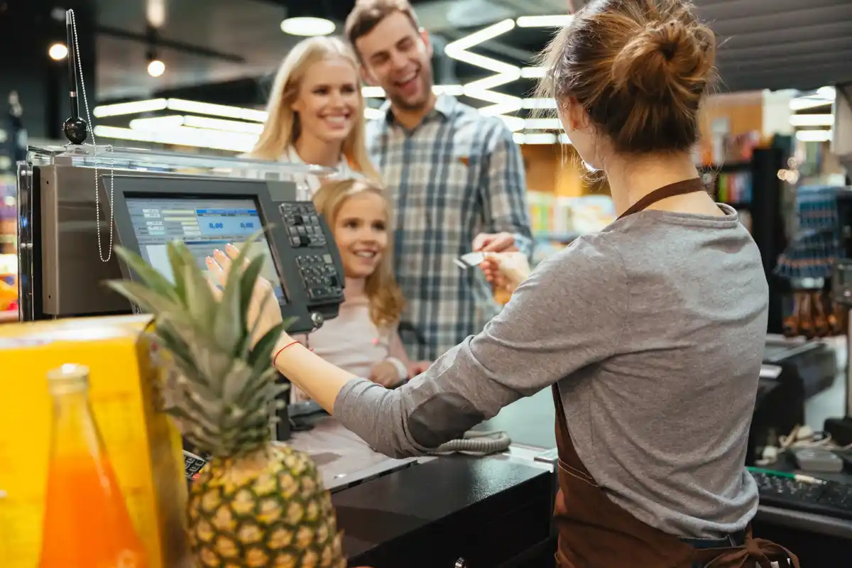czech people paying with cash in supermarket
