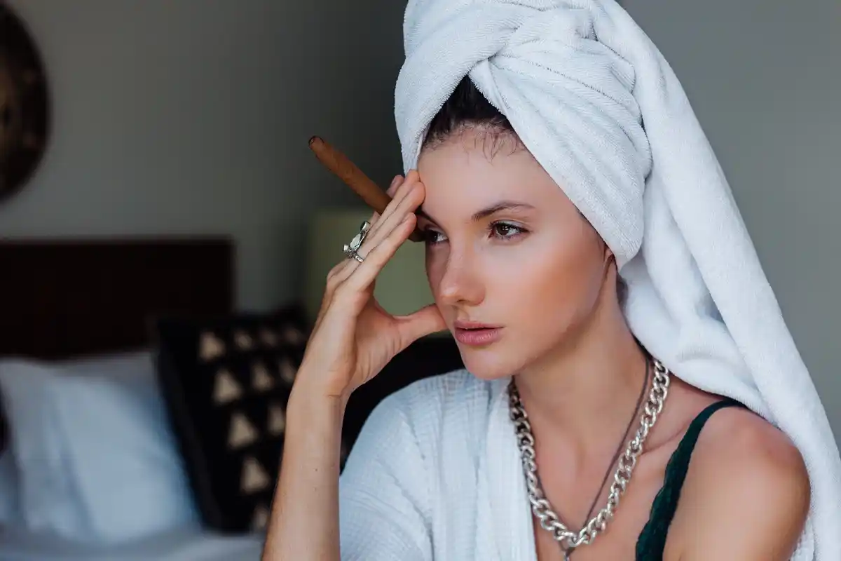 czech woman applying eye cream bathroom