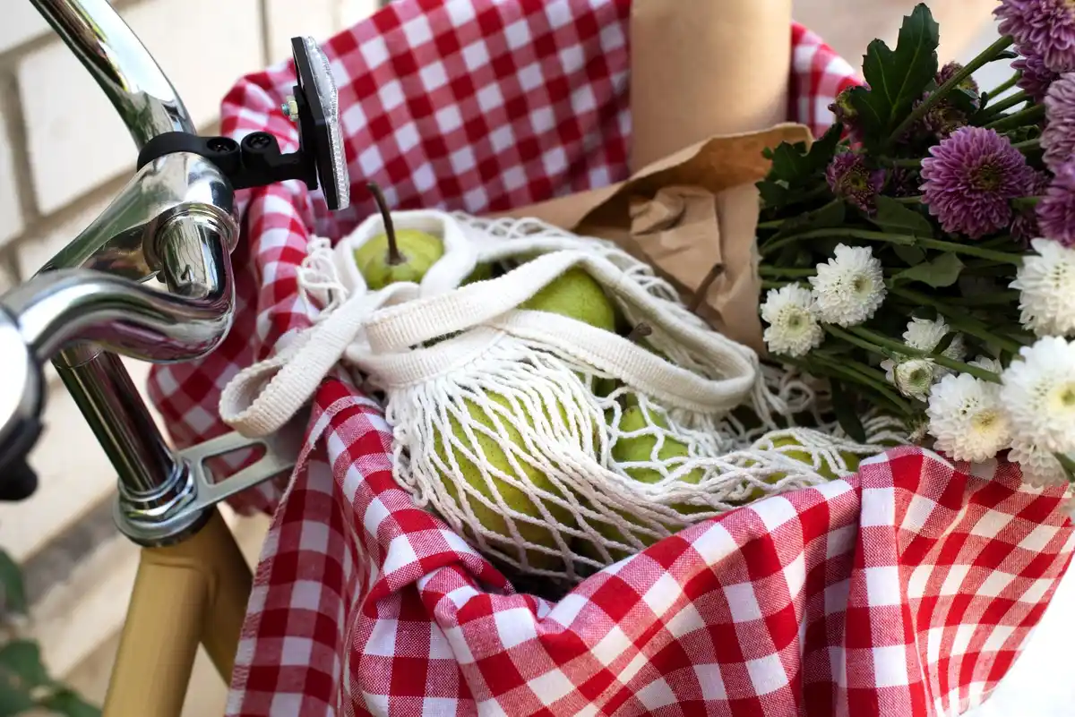 fresh basil bouquet with plastic bag cover on table