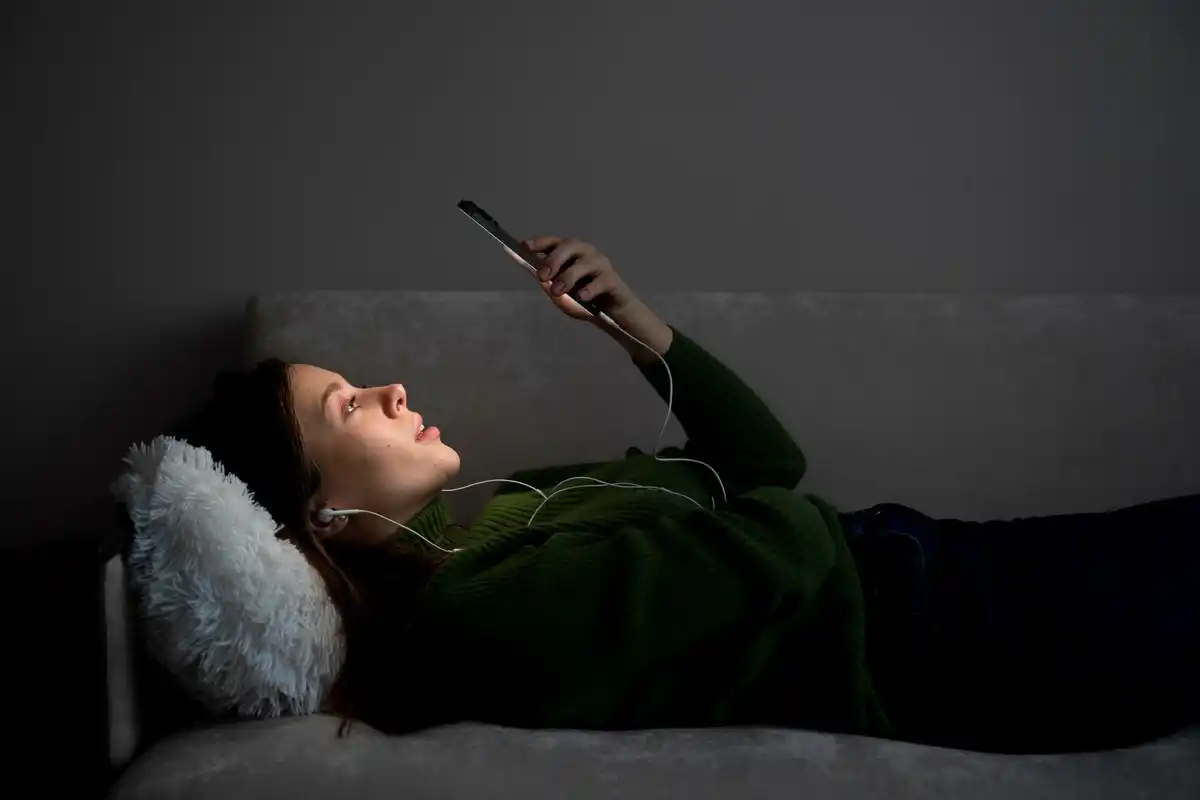 phone charging at night bedroom warning