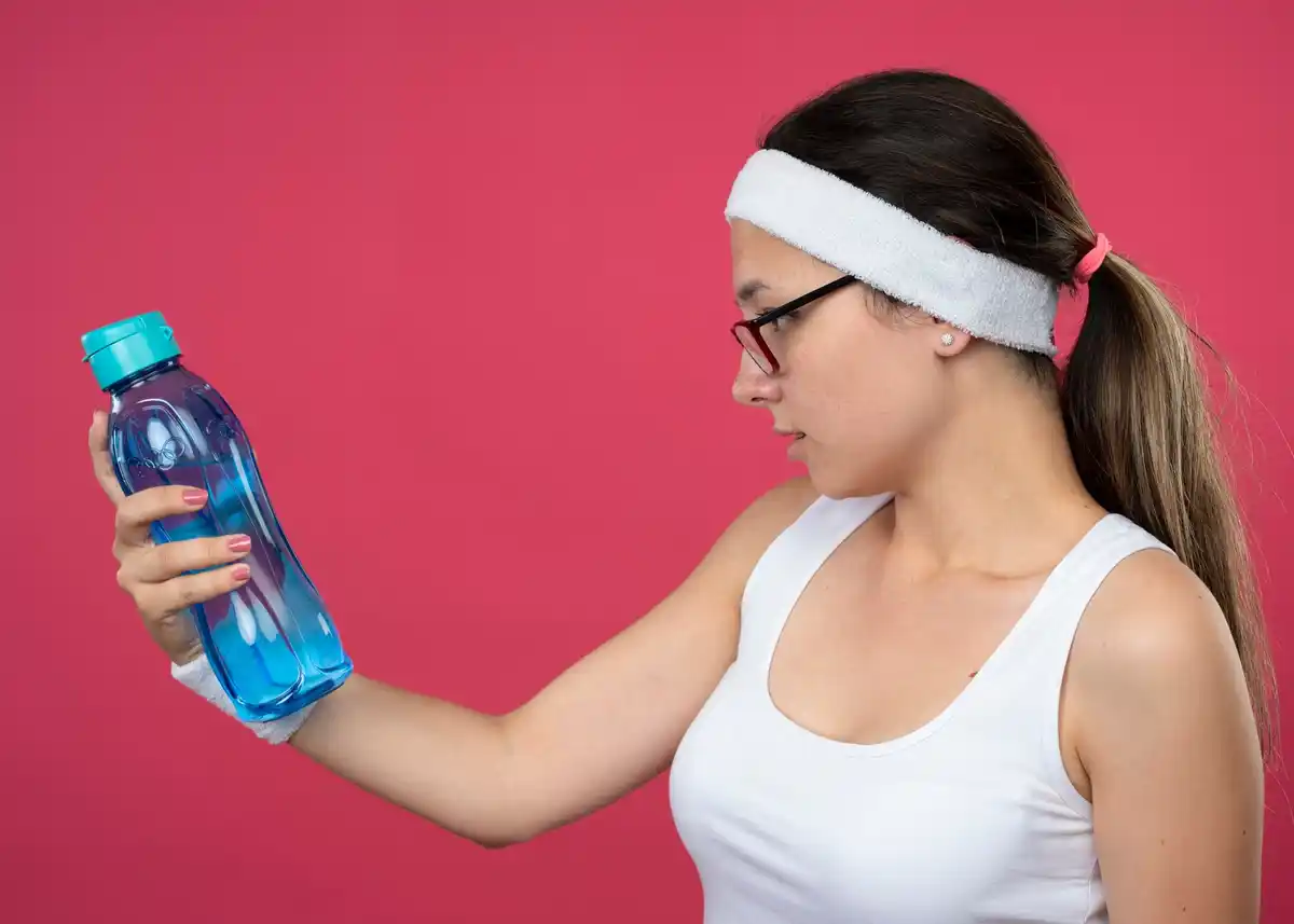 athlete without sports drink water bottle clean healthy