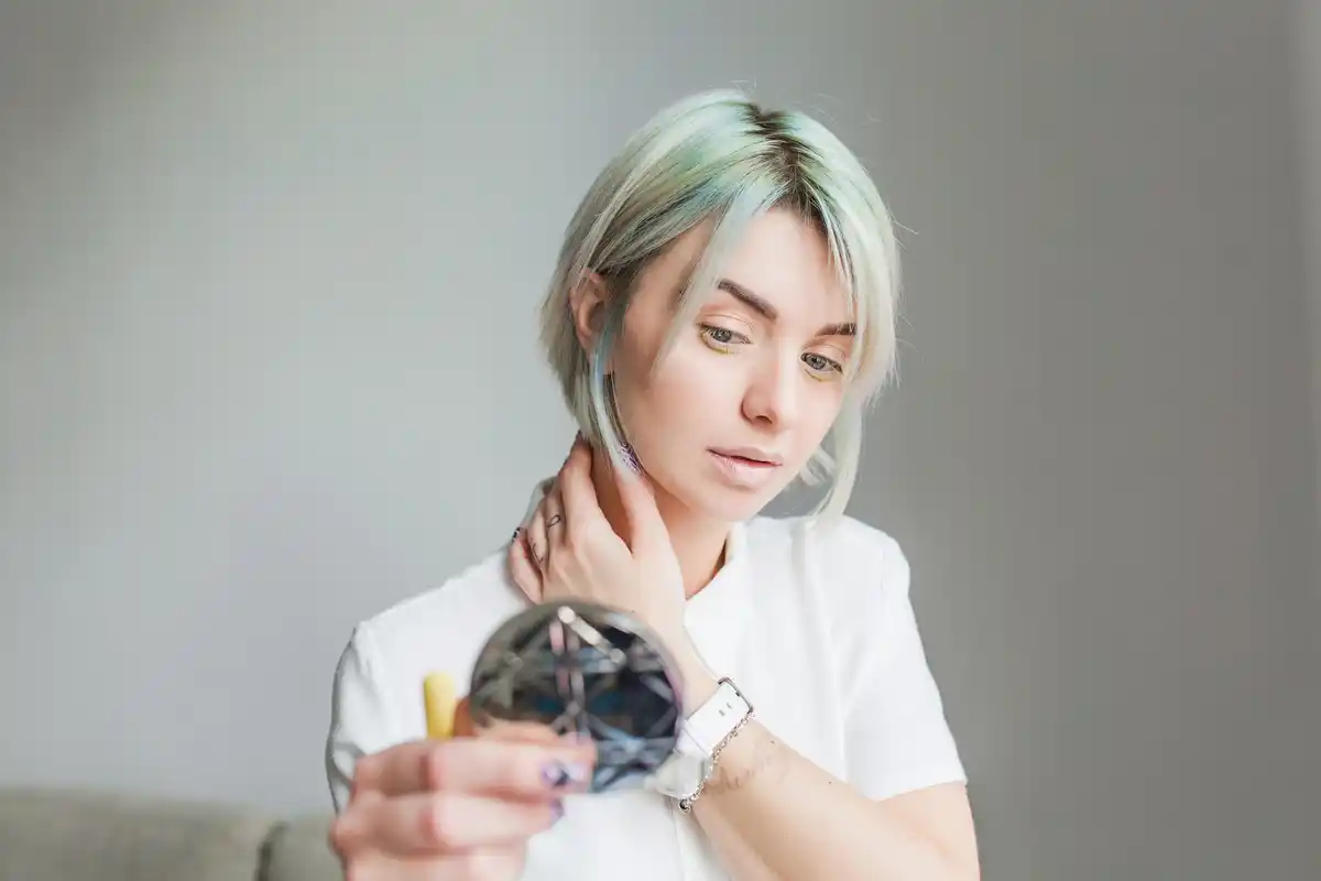 woman applying face cream wrong technique