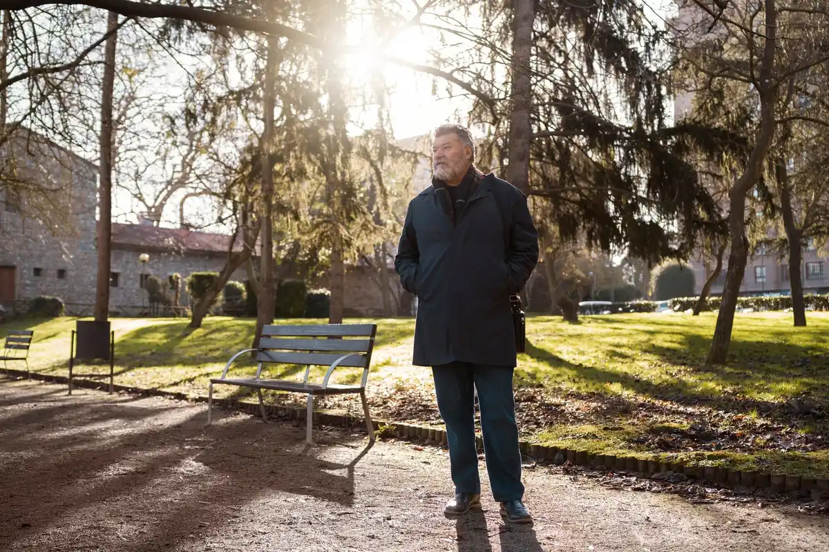 middle aged czech walking outdoors urban city park