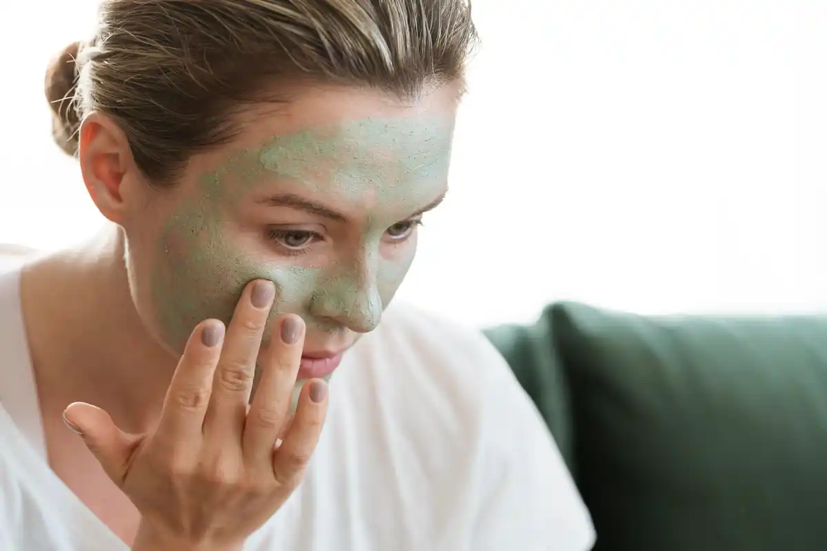 toothpaste on face acne treatment closeup