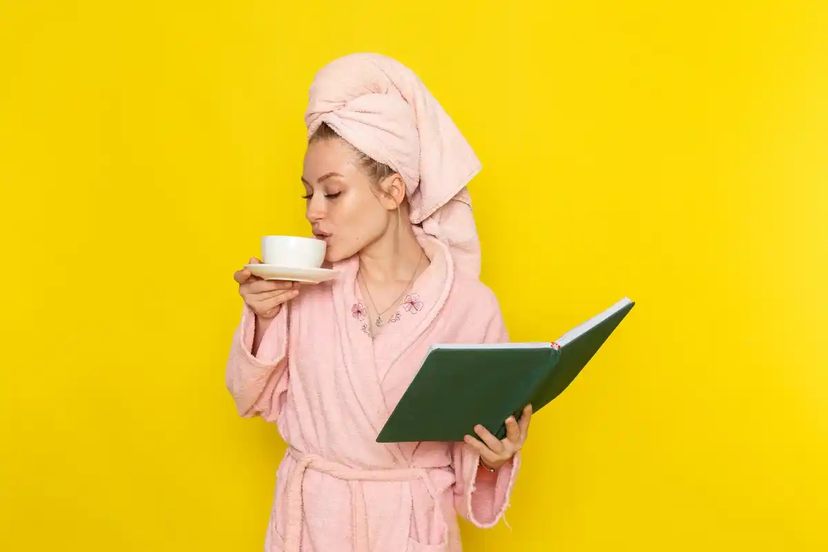 woman washing face with just water morning routine