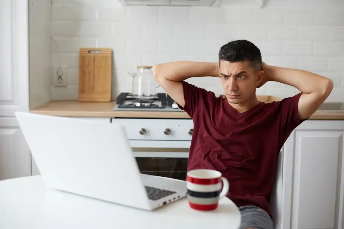 man stretching morning pain real home