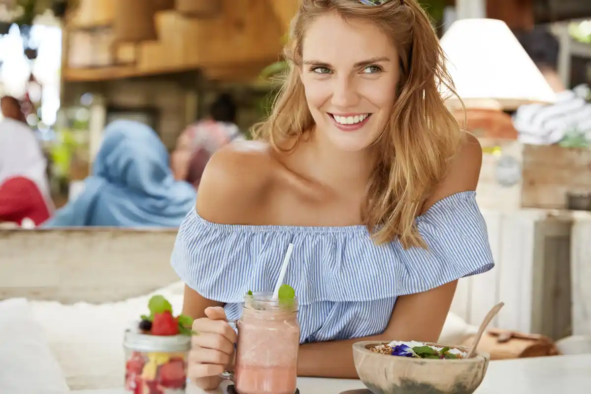young czech woman healthy breakfast protein shake