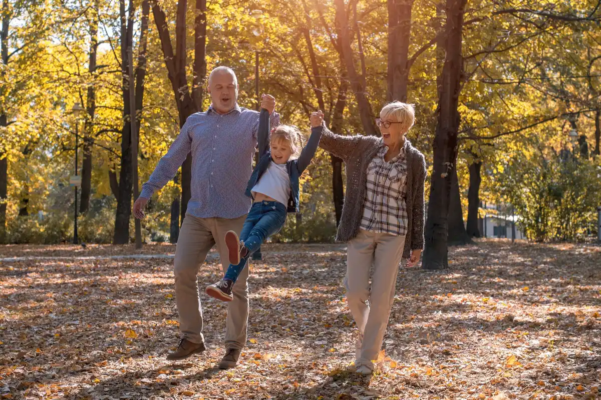 senior couple walking park autumn Czech Republic