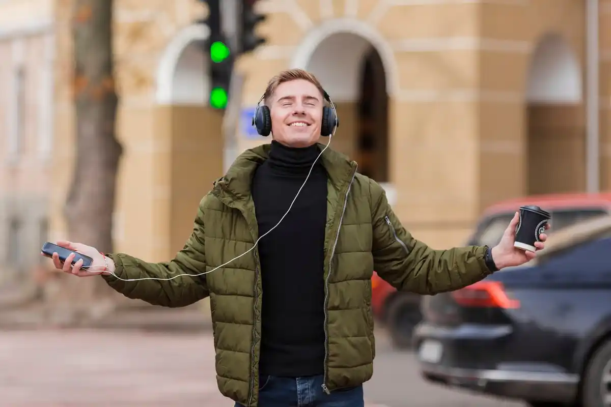 young people wired headphones streetstyle Prague