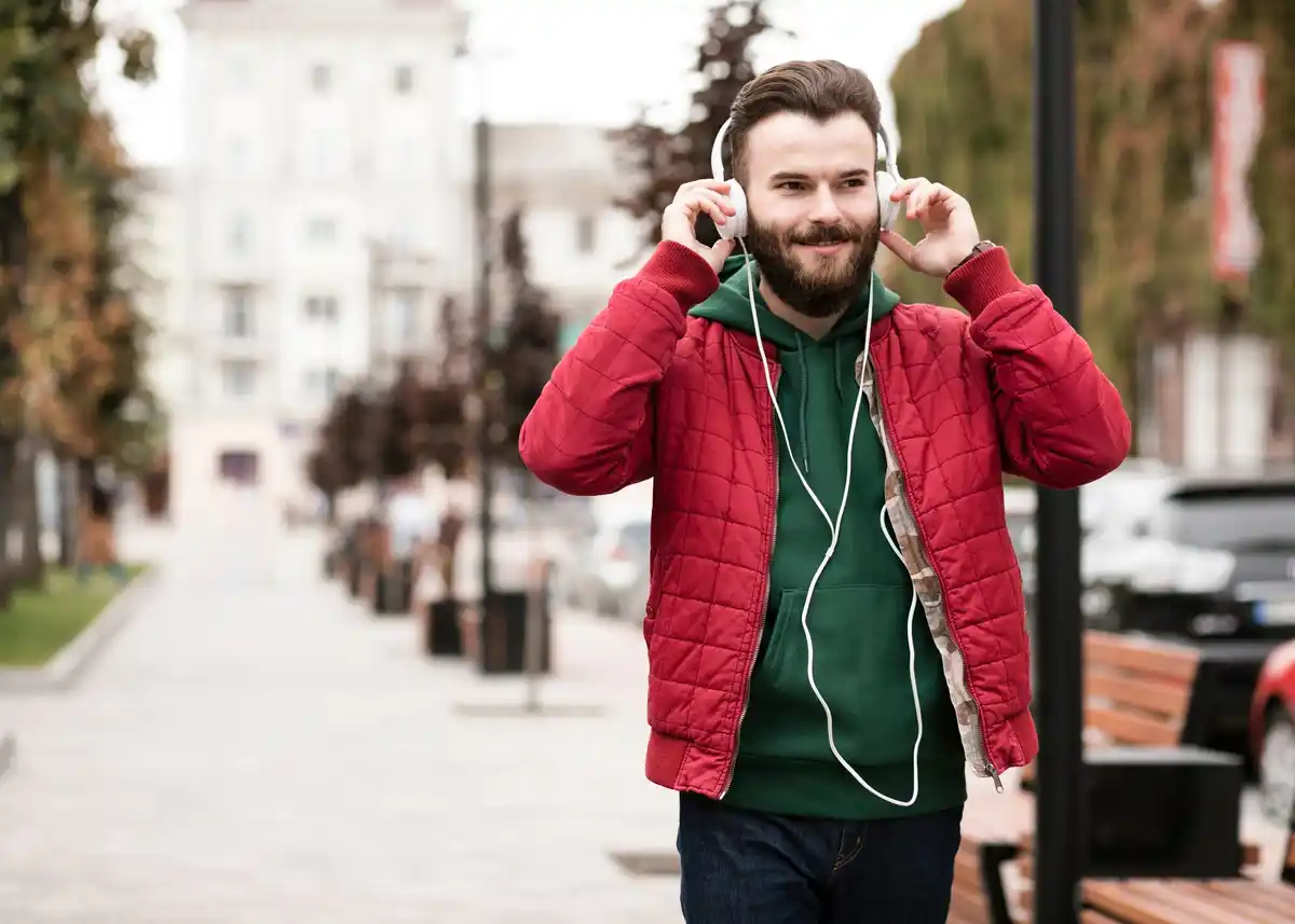 young people wired headphones prague street