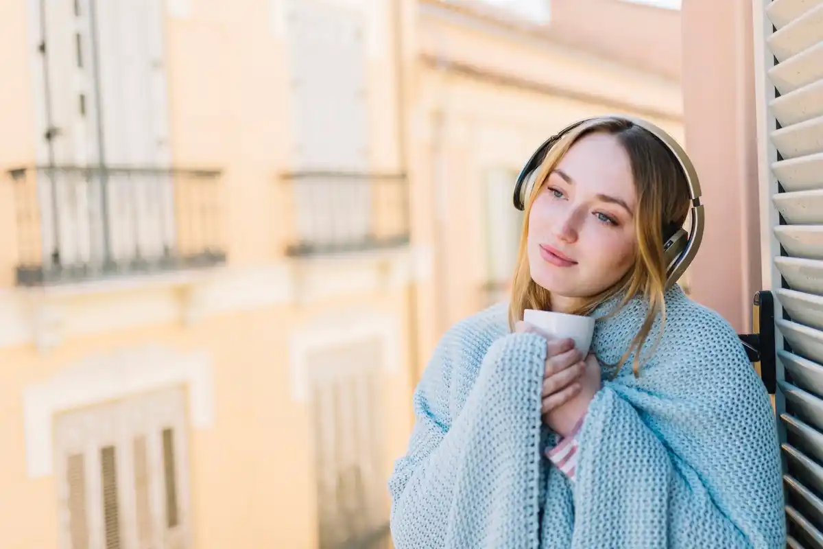 hipster teen listening music wired headphones vintage cafe