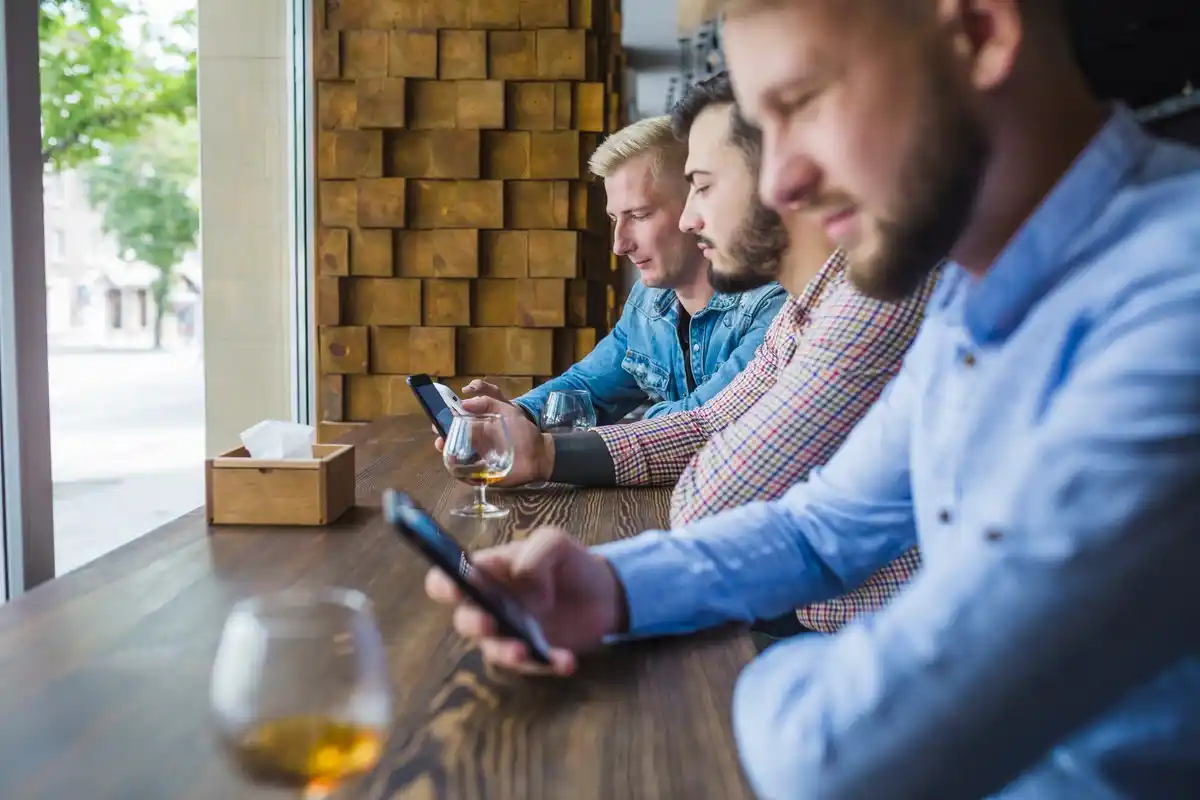 Czech people using weather app in café
