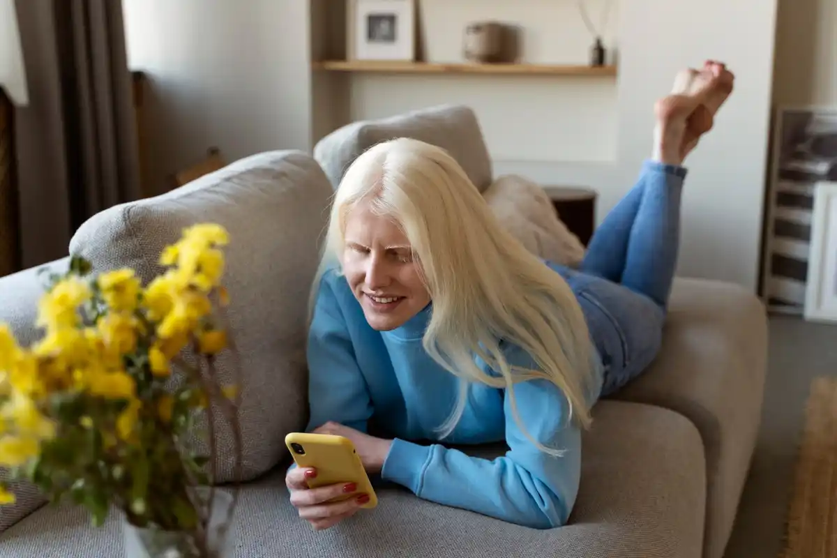 Czech elderly woman using smartphone comfortably