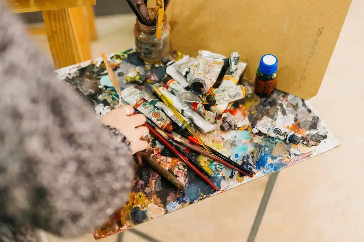 artist messy palette dried acrylics Prague sunlight