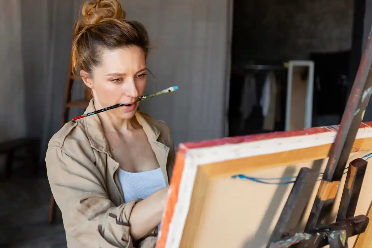 artist using dehumidifier studio drying painting