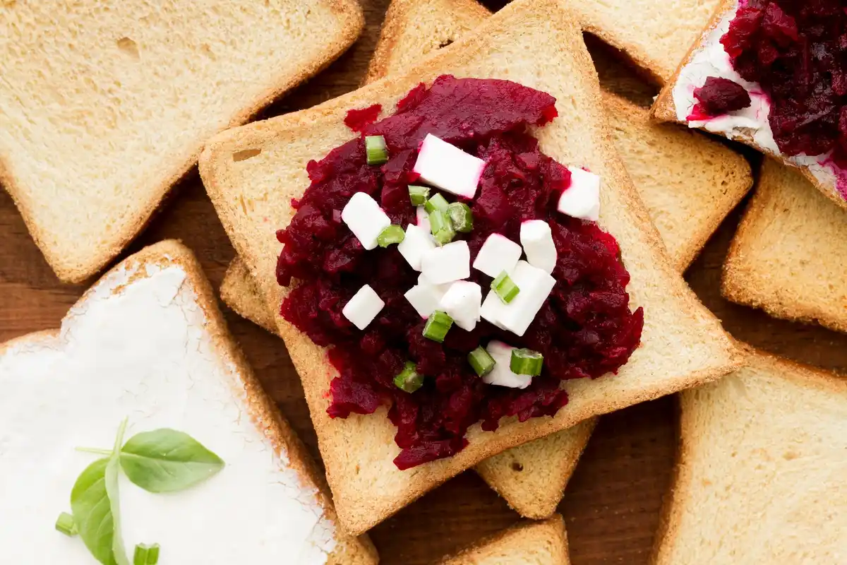 Czech open sandwich with fresh bread, butter, radish and chives