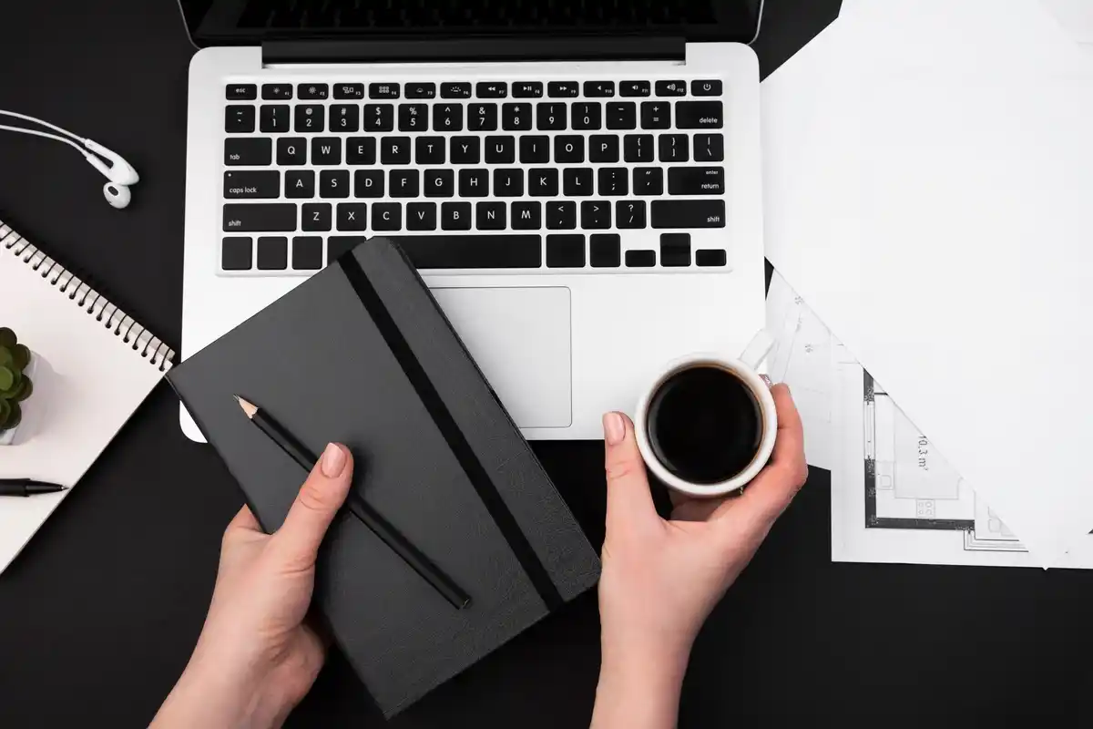 Czech startup workspace notebook coffee brainstorm
