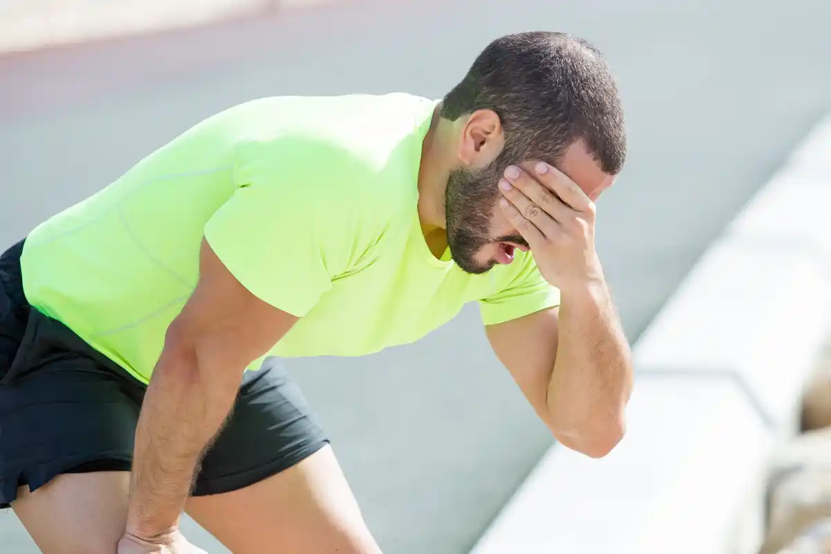 tired athlete after workout outside