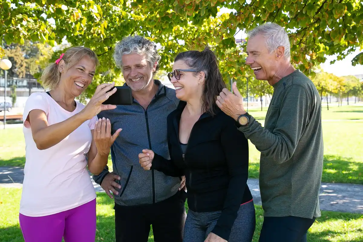 active seniors exercising together in Prague park