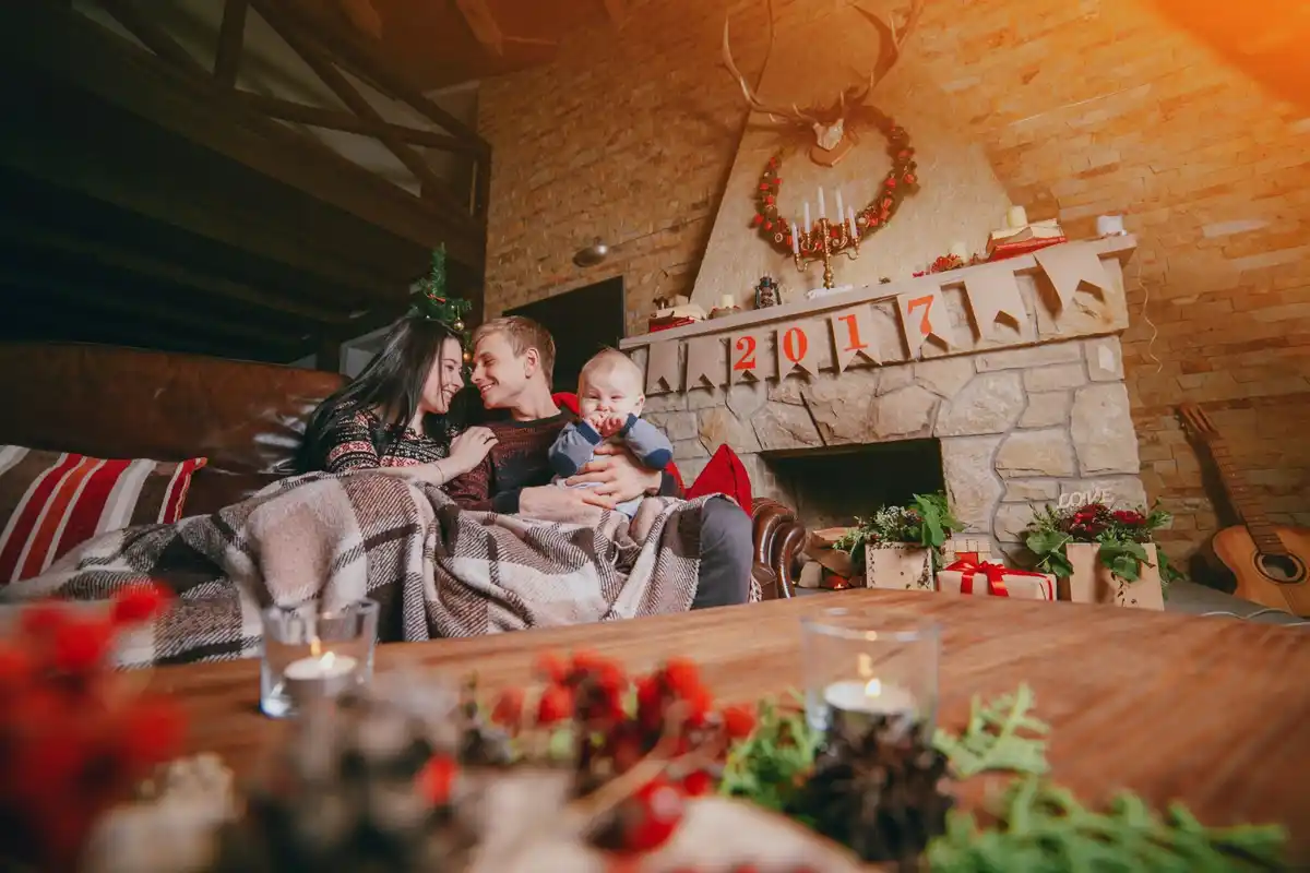 Czech family preparing home for winter outside house