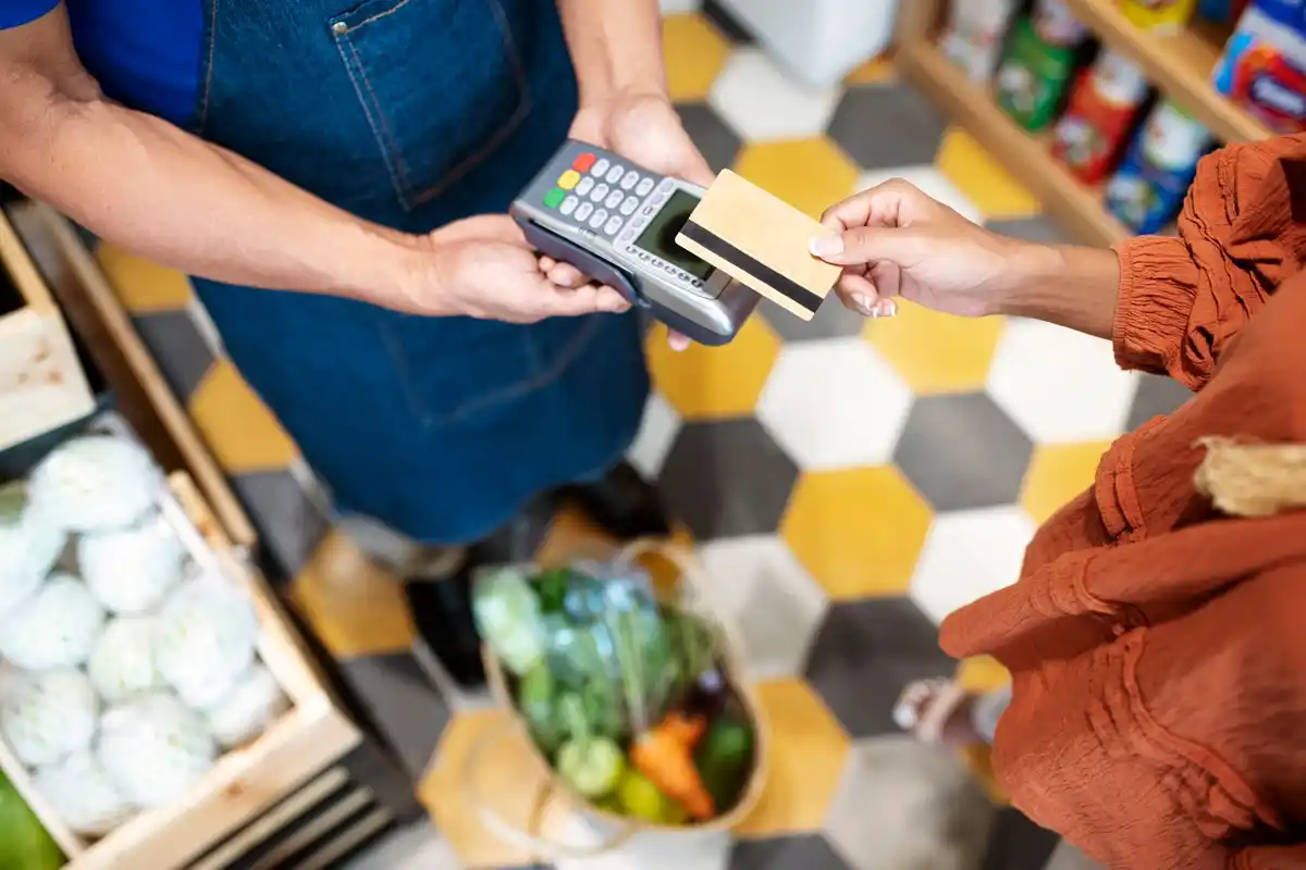 paying with cash in Czech supermarket