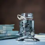 Czech coins in a jar on a home kitchen table