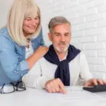 Czech senior saving money at home