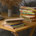 pile of shop receipts in Czech language on wooden table