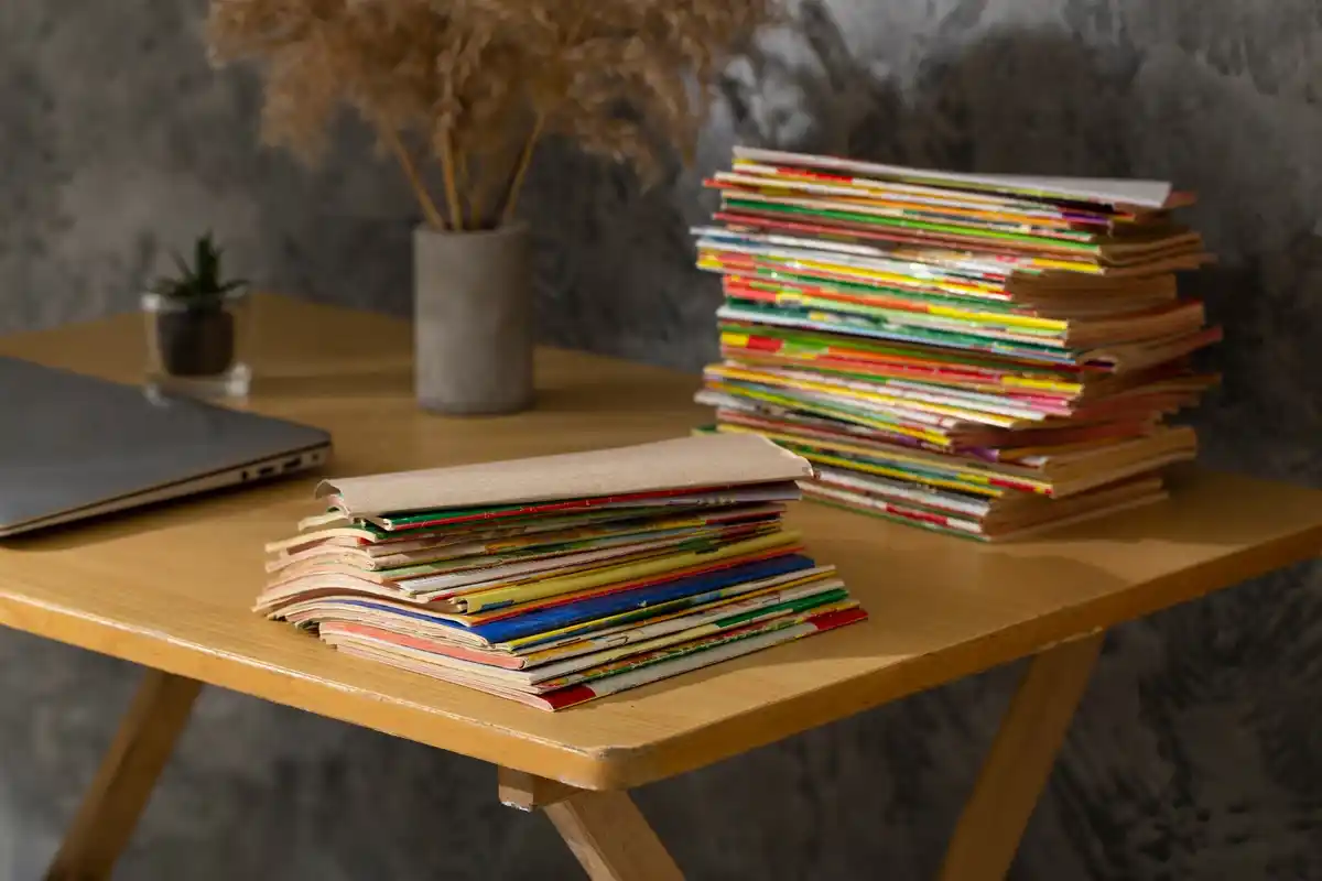 pile of shop receipts in Czech language on wooden table
