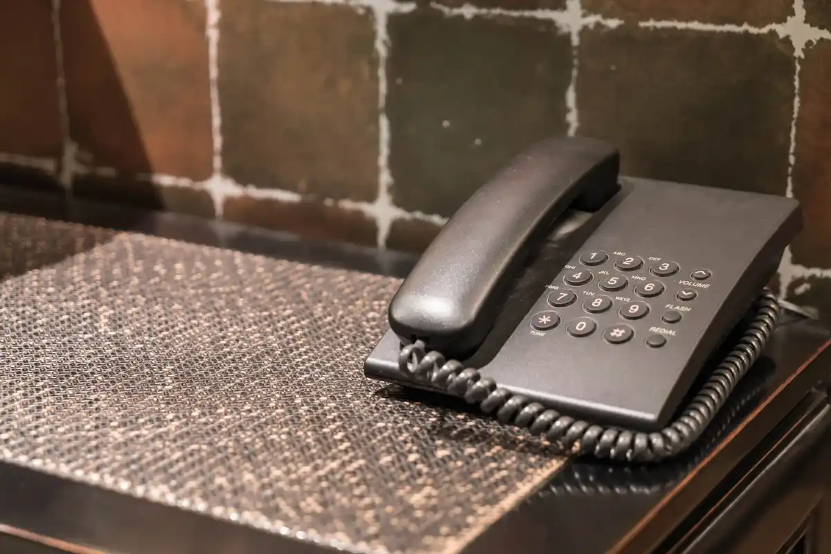 old brick phone focus work Czech table