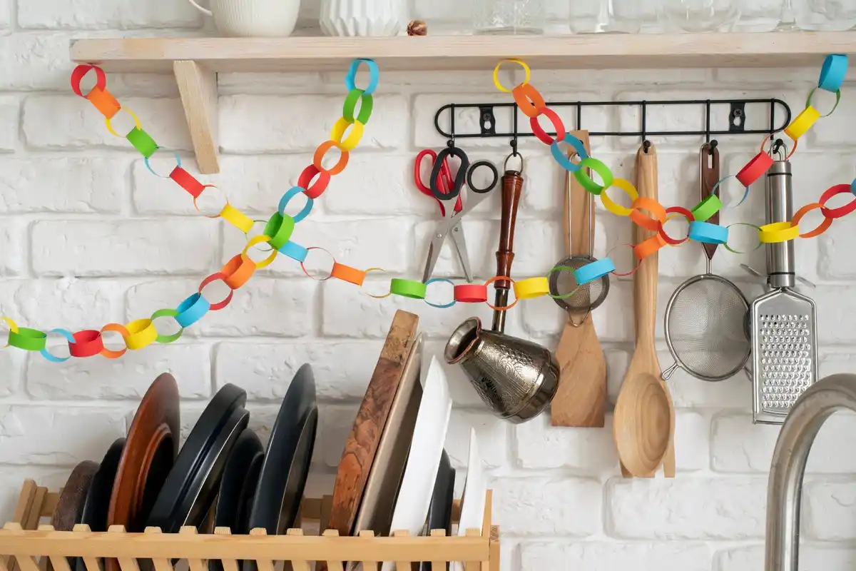 cluttered kitchen drawer with knives