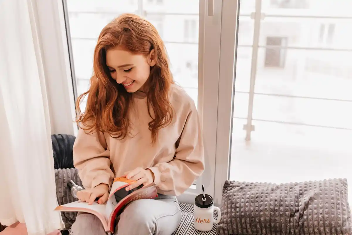 relaxed czech woman clean home reading book