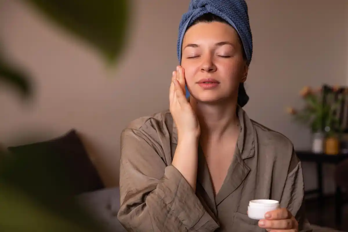 face massage self care woman home