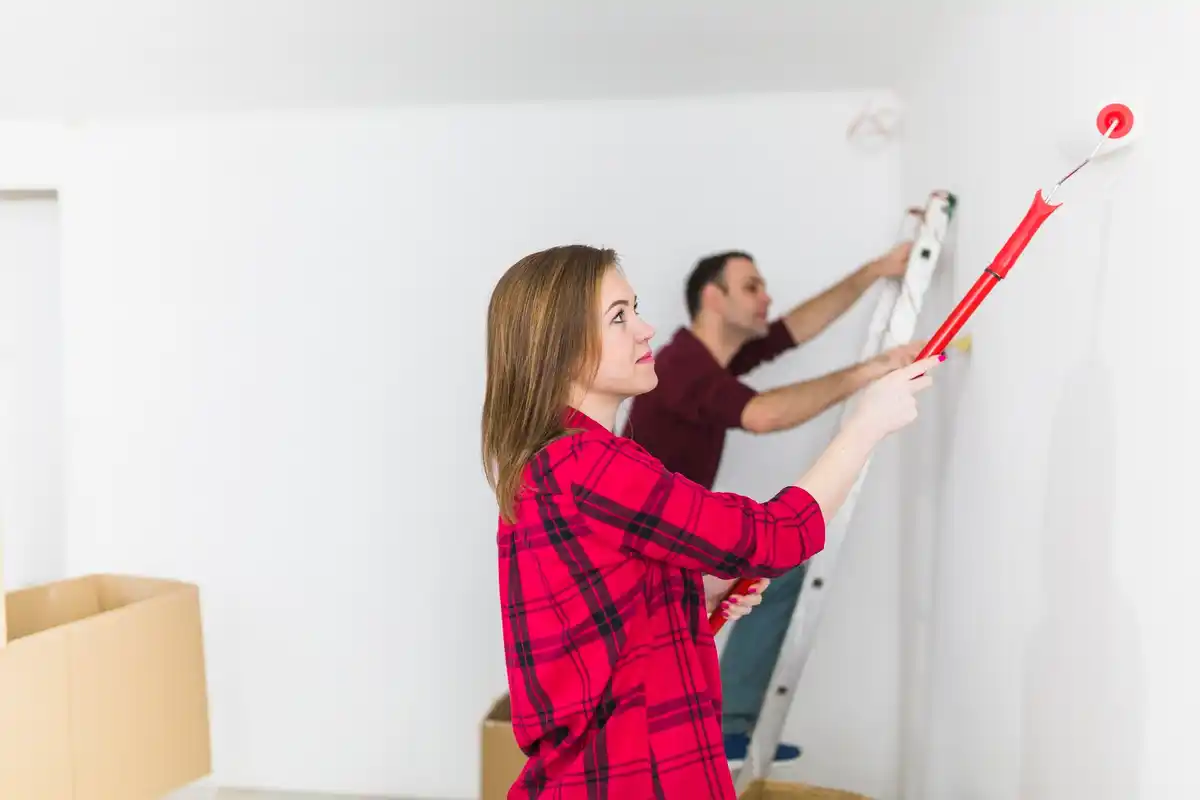 Czech people painting walls with vibrant colors at home