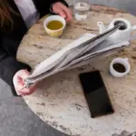 cleaning windows with old newspapers