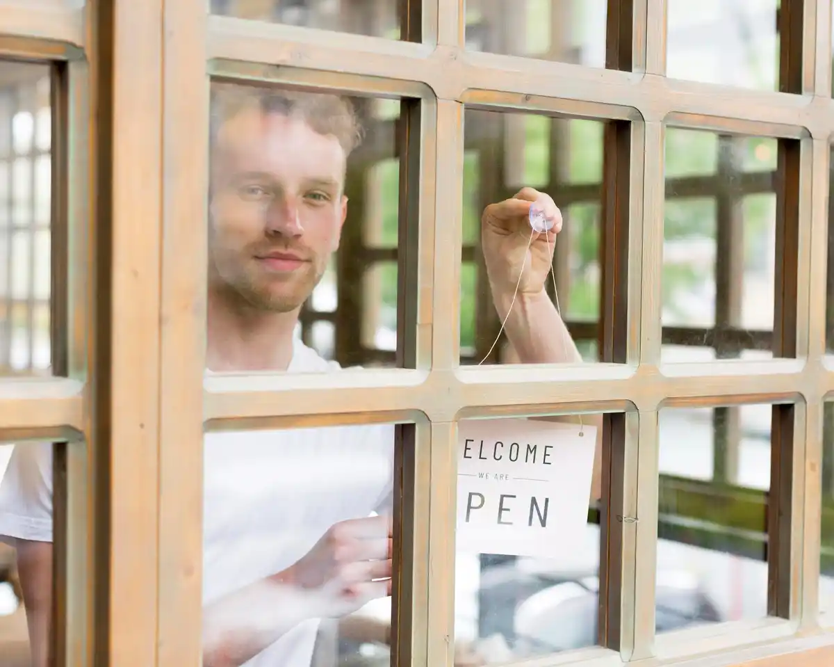 cleaning windows with old newspapers