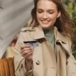 young traveller paying by card abroad czech modern