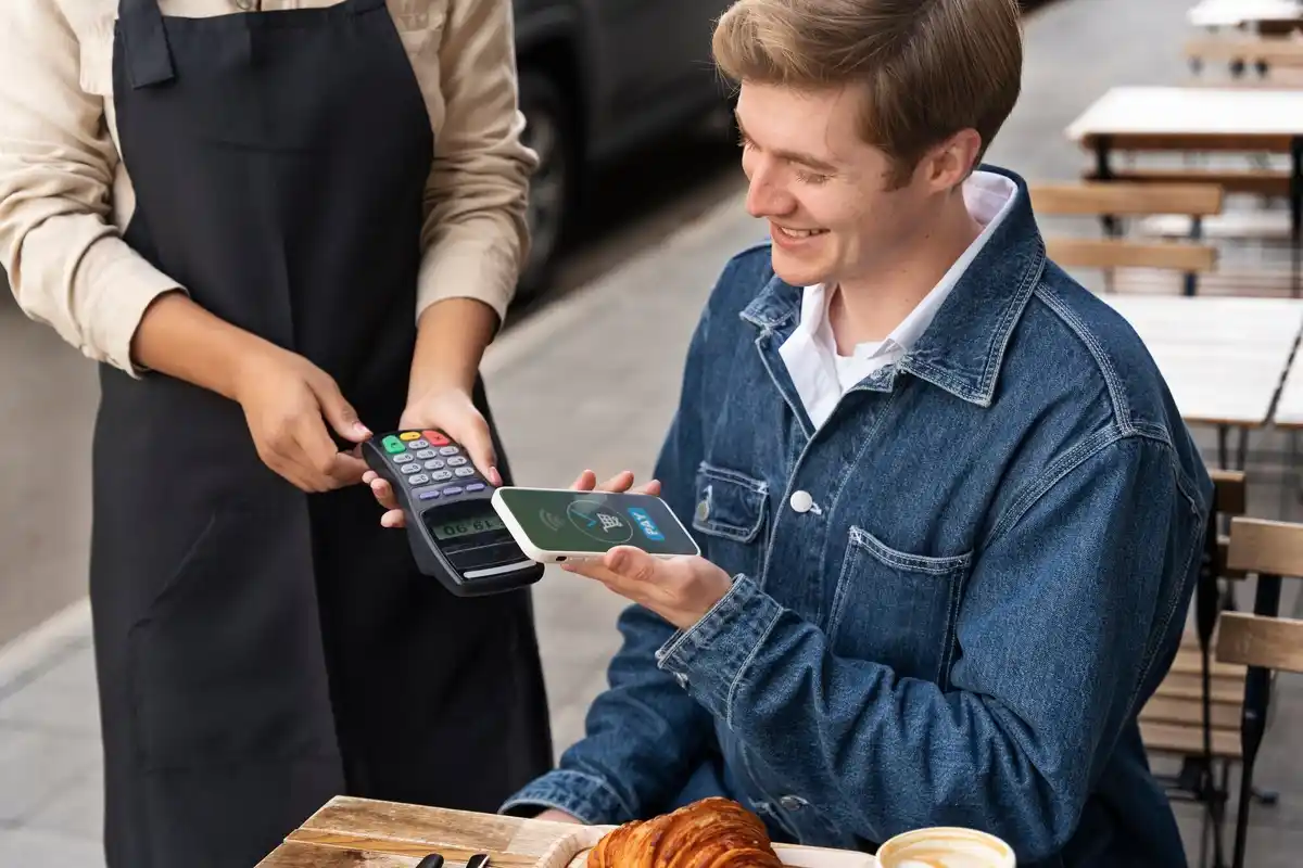 young czech people using supermarket cashback at checkout