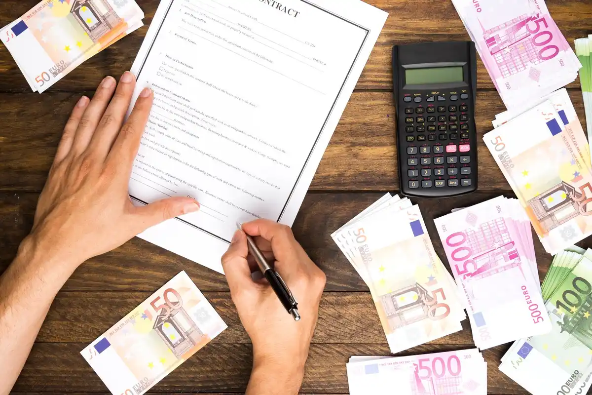 Czech receipt with money on table