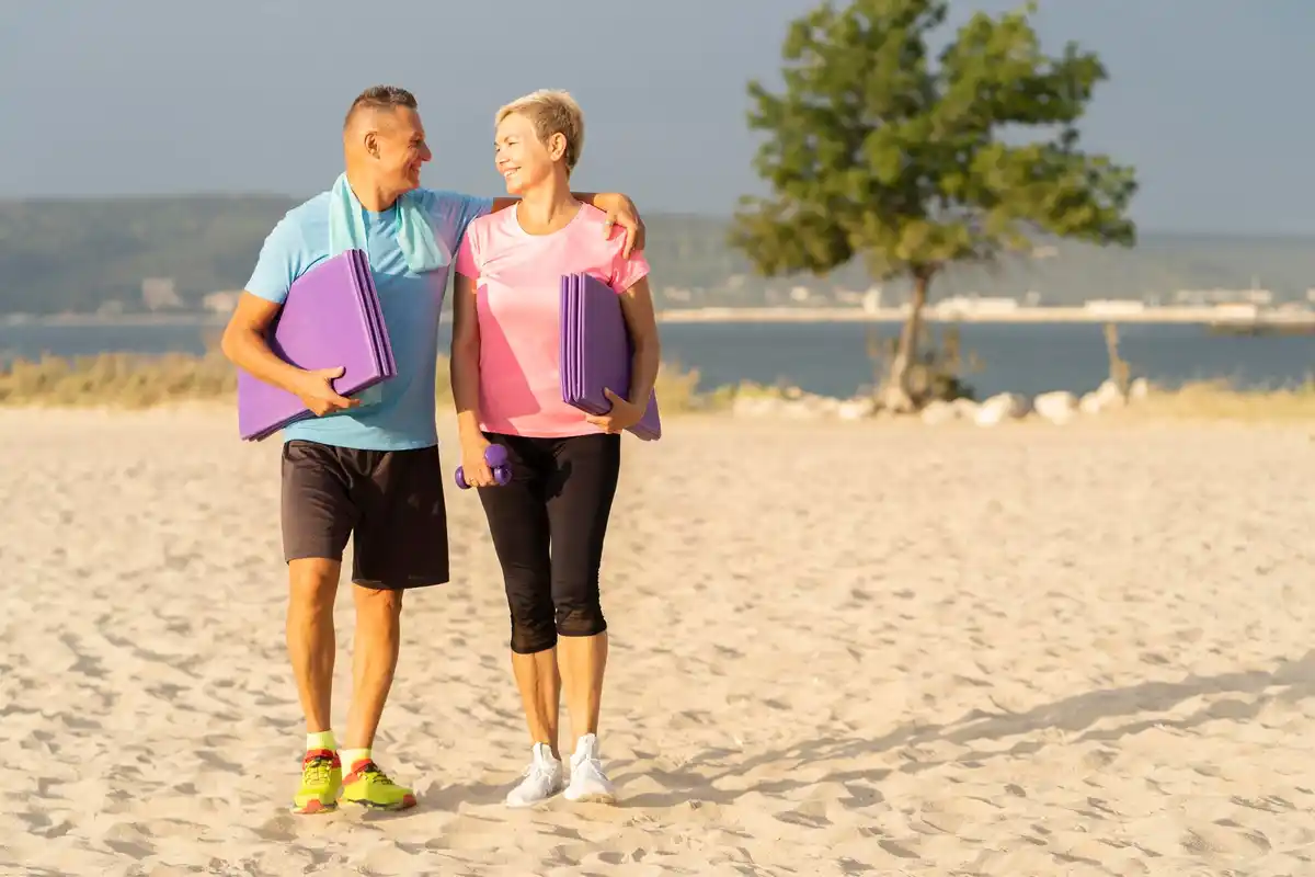 active mature Czech couple walking park fitness lifestyle