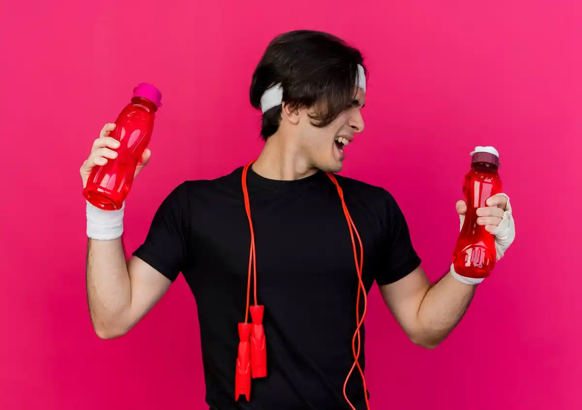 energy drink in gym hands sportsman