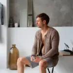 cold shower morning Czech man minimalist bathroom