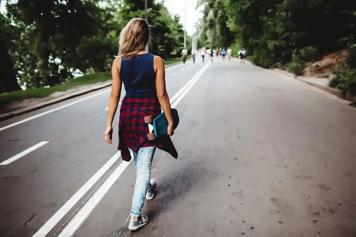 walking backwards in park city street