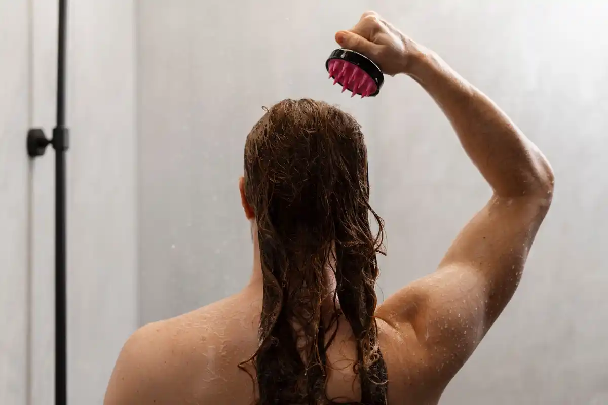 hot shower damaging hair closeup european woman